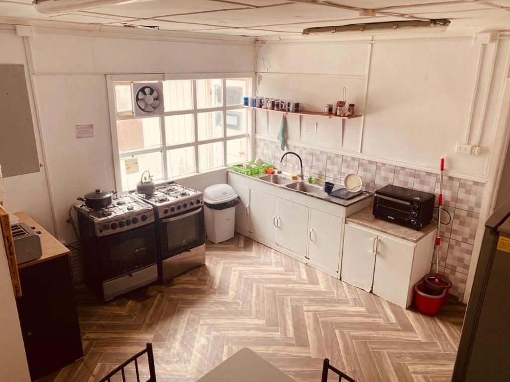 פורטו נטאלס Hostel Paihuen מראה חיצוני תמונה